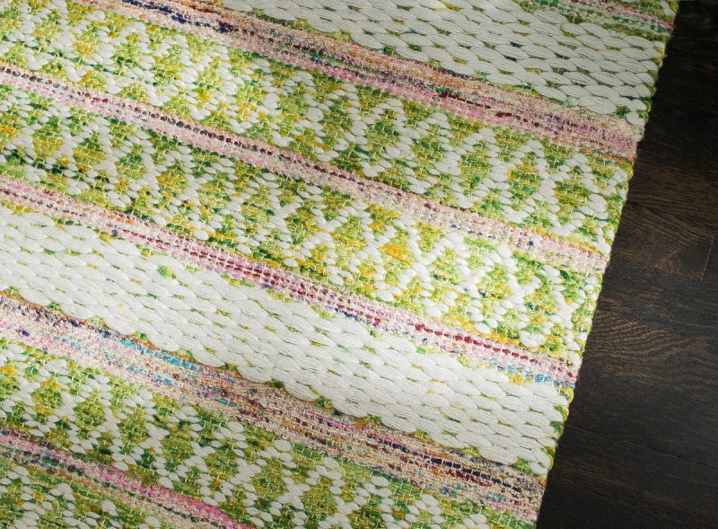 saranya hand loomed green and pink rug 451